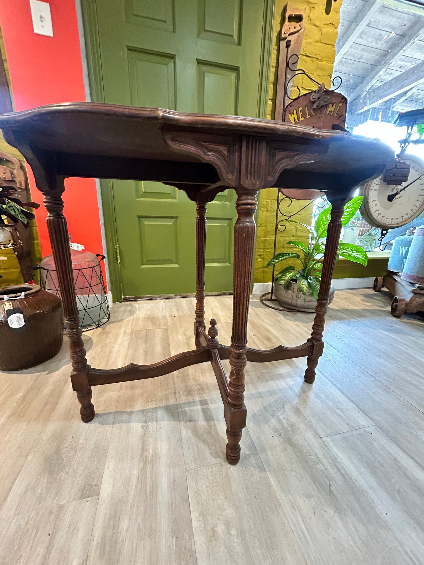 Antique Wooden Oval Side Table with Undercut Center Design
